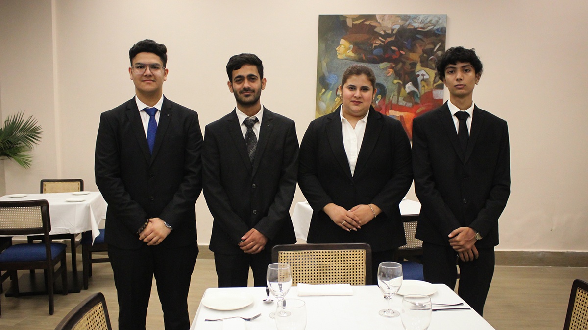BBA Hospitality students in formal attire